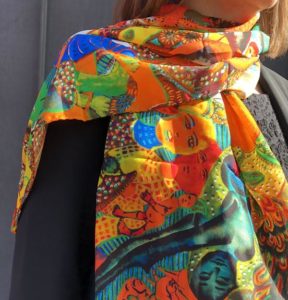 Model wearing Mirka Mora scarf
